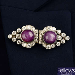 A mid 20th century platinum and gold, star ruby and diamond double clip brooch.