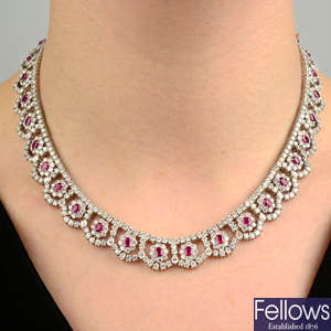 A ruby and brilliant-cut diamond cluster fringe necklace, with pear-shape diamond accents.