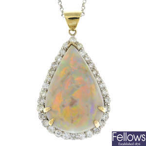An opal and brilliant-cut diamond pendant, with 18ct gold chain.