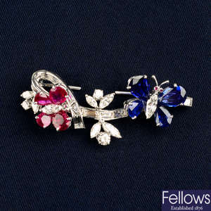 An 18ct gold diamond, ruby and sapphire butterfly brooch, by Van Cleef & Arpels.