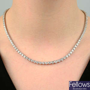 An 18ct gold brilliant-cut diamond line necklace.
