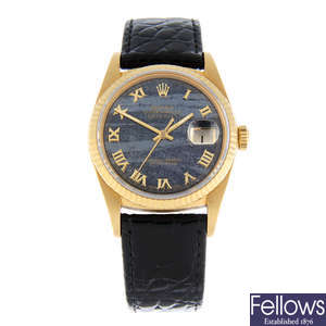 ROLEX - a gentleman's 18ct yellow gold Oyster Perpetual Datejust wrist watch with a ferrite dial.