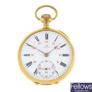 A yellow metal open face pocket watch by Omega.