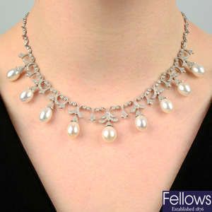 A cultured pearl and diamond fringe necklace.