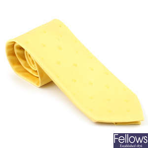 ROLEX - a yellow silk tie.