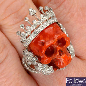 A coral and diamond skull ring, by Lydia Courteille.