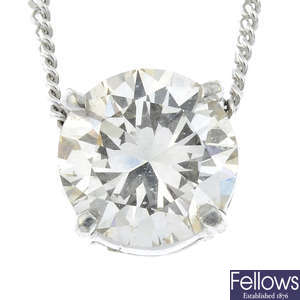 A brilliant-cut diamond single-stone pendant, with18ct gold chain.