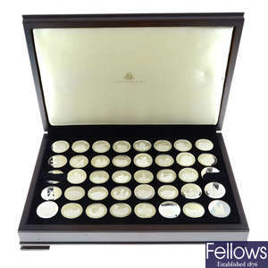 The Ancient Counties of England, a complete cased set of forty silver medallions.