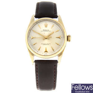 ROLEX - a gold plated Oyster Perpetual wrist watch, 34mm.