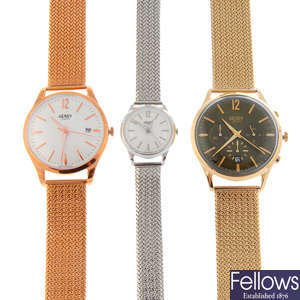 A group of five assorted watches, to include four Henry London watches and a Radley watch with two watch straps by Daniel Wellington.