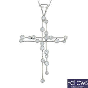 An openwork brilliant-cut diamond cross pendant, with 18ct gold chain.