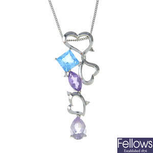 An 18ct gold amethyst, blue topaz and diamond openwork heart pendant, with 9ct gold chain.