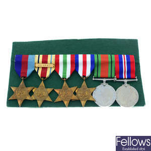 WWII medal group, comprising six medals, together with a pocket telescope. (7).