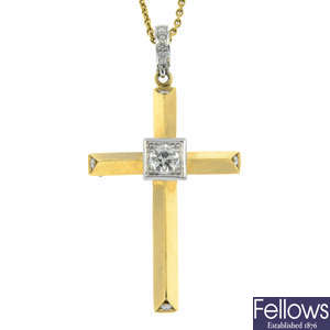 An 18ct gold vari-cut diamond cross pendant, with 18ct gold chain, designed by Dawn French.