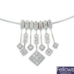 A brilliant-cut diamond pendant, with snake-link collar chain.