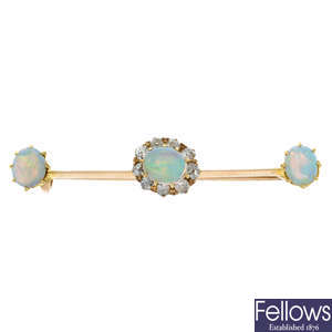 A late 19th century opal cabochon and old-cut diamond bar brooch.