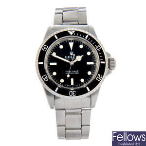 ROLEX - a stainless steel Oyster Perpetual Submariner bracelet watch, 39.5mm.