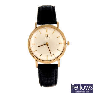 OMEGA - a 9ct yellow gold wrist watch, 31mm.