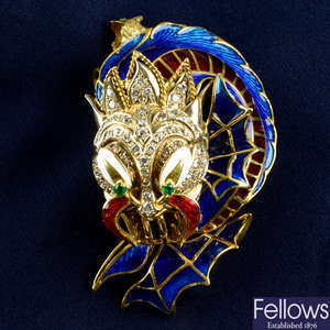 A mid 20th century 18ct gold enamel, diamond and emerald dragon brooch/pendant.