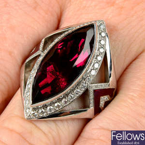 A red tourmaline, brilliant-cut diamond and enamel ring.