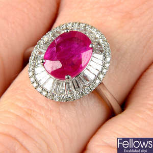 An 18ct gold ruby, tapered baguette and brilliant-cut diamond cluster ring.