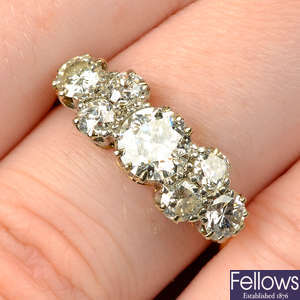 An 18ct gold circular-cut diamond dress ring.
