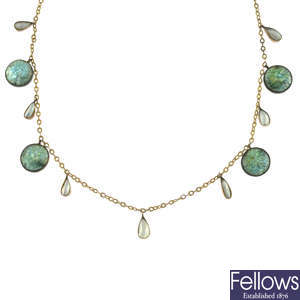 An early 20th century Arts and Crafts 9ct gold enamel and split pearl multi-drop necklace.