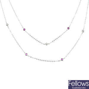 An 18ct gold ruby and diamond two-row necklace.
