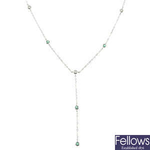 An 18ct gold emerald and diamond necklace with an emerald drop.