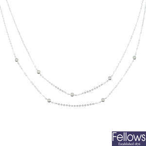 An 18ct gold brilliant-cut diamond two-row necklace.