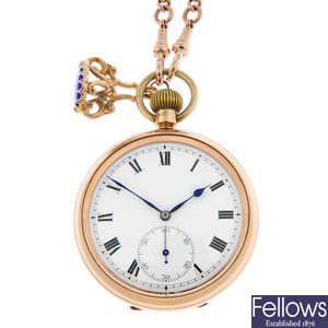 A 9ct yellow gold open face pocket watch (50mm) with a 9ct yellow gold Albert chain and fob.