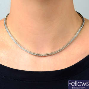 A square-shape diamond line necklace, with rectangular-link back-chain.