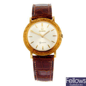 OMEGA - a 18ct yellow gold Genève wrist watch, 33mm.