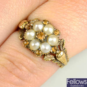 An early to mid 19th century gold, orange topaz and split pearl floral cluster ring.