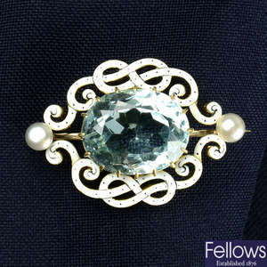 An early 20th century gold, aquamarine, bouton pearl and enamel brooch.