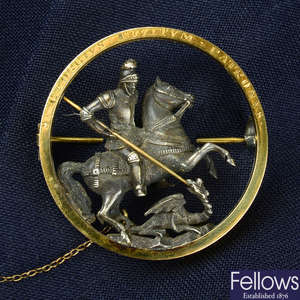 A late 19th century silver and gold St. George and the dragon brooch, engraved to the surround 'S. Georgivs Eqvitvm Patronvs'.