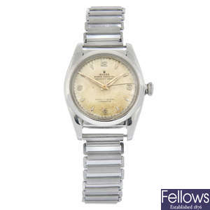 ROLEX - a stainless steel Oyster Perpetual 'Bubble Back' bracelet watch retailed by Serpico y Laino, 32mm.