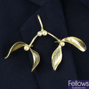An early to mid 20th century Austrian 14ct gold cultured pearl mistletoe brooch.