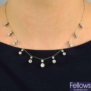 An early 20th century graduated old-cut diamond fringe necklace.