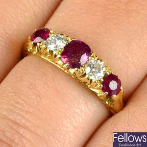 An early 20th century 18ct gold ruby and circular-cut diamond five-stone ring.