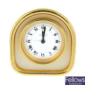 CARTIER - a gold plated alarm clock, 75mm.