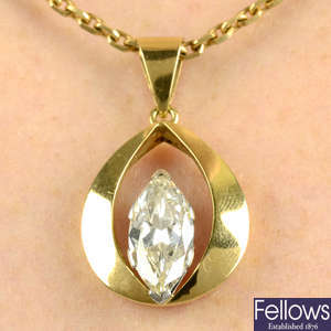 A marquise-shape diamond pendant, with chain.