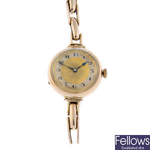 A 9ct yellow gold bracelet watch (28mm) with a 9ct gold bracelet watch.