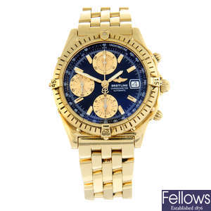 BREITLING - an 18ct yellow gold Chronomat chronograph bracelet watch, 39mm.