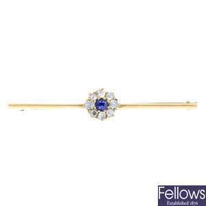 An early 20th century 15ct gold sapphire and diamond cluster bar brooch.