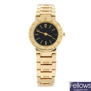 BULGARI - an 18ct yellow gold Bulgari bracelet watch, 23mm.