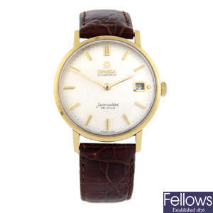 OMEGA - an 18ct yellow gold Seamaster De Ville wrist watch, 34mm.