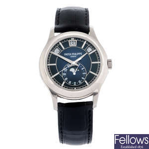 CURRENT MODEL: PATEK PHILIPPE - an 18ct white gold Annual Calendar Moon Phase wrist watch, 40mm.
