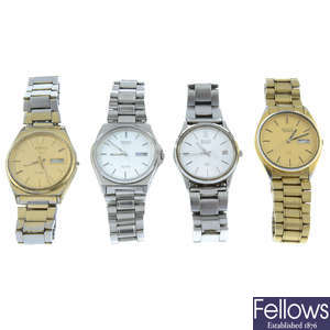 A group of fourteen assorted Seiko watches.