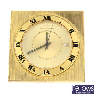 JAEGER LECOULTRE - a gold plated Memovox travel alarm clock, 45mm.